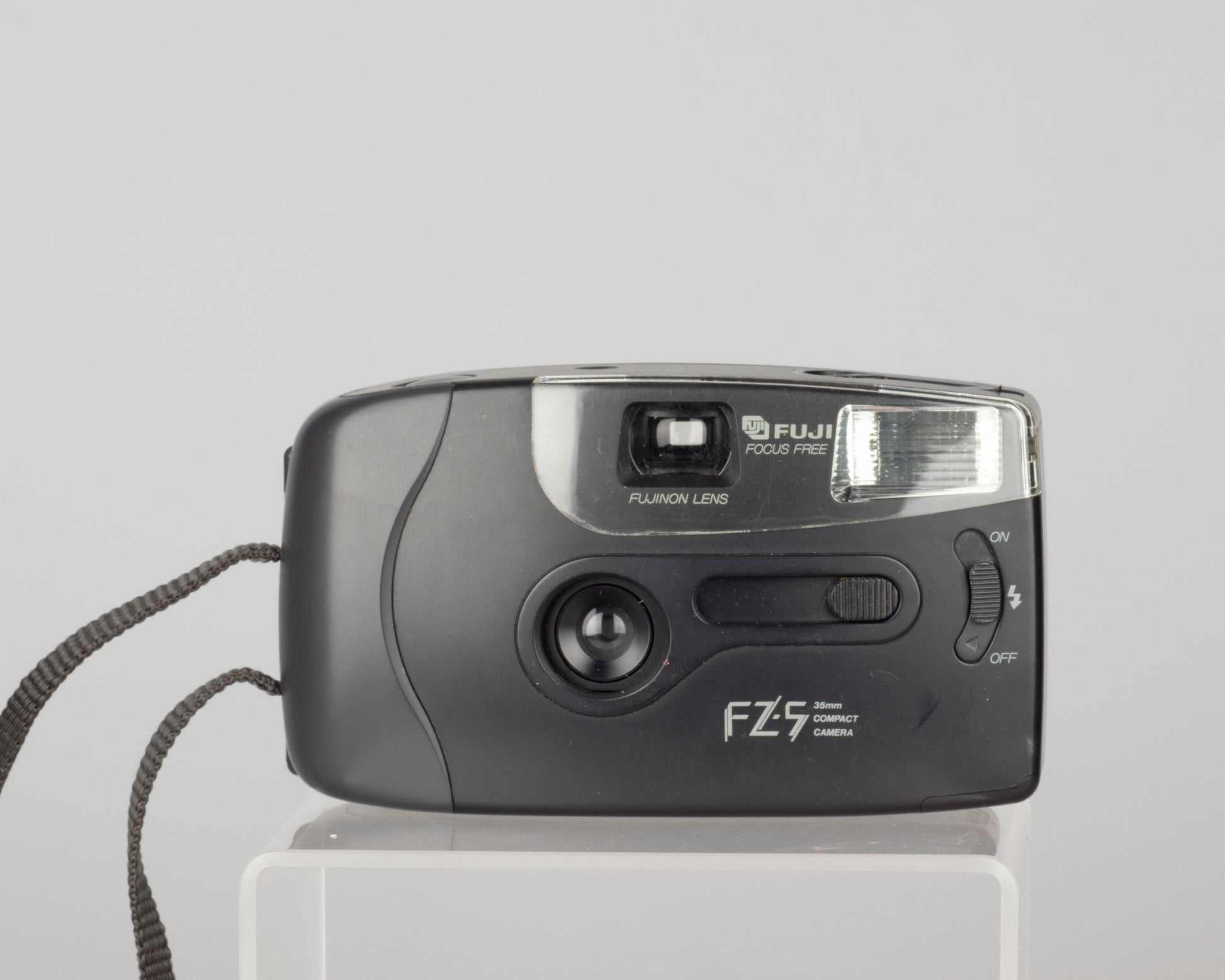 The Fujifilm FZ-5 is a simple mechanical 35mm film camera with a built-in flash