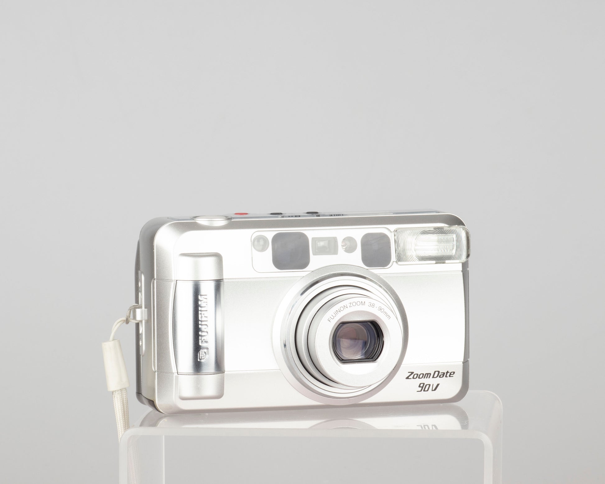 The Fujifilm Zoom Date 90V is a compact 35mm point-and-shoot camera from the early 2000s