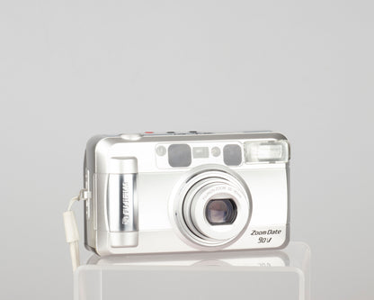 The Fujifilm Zoom Date 90V is a compact 35mm point-and-shoot camera from the early 2000s