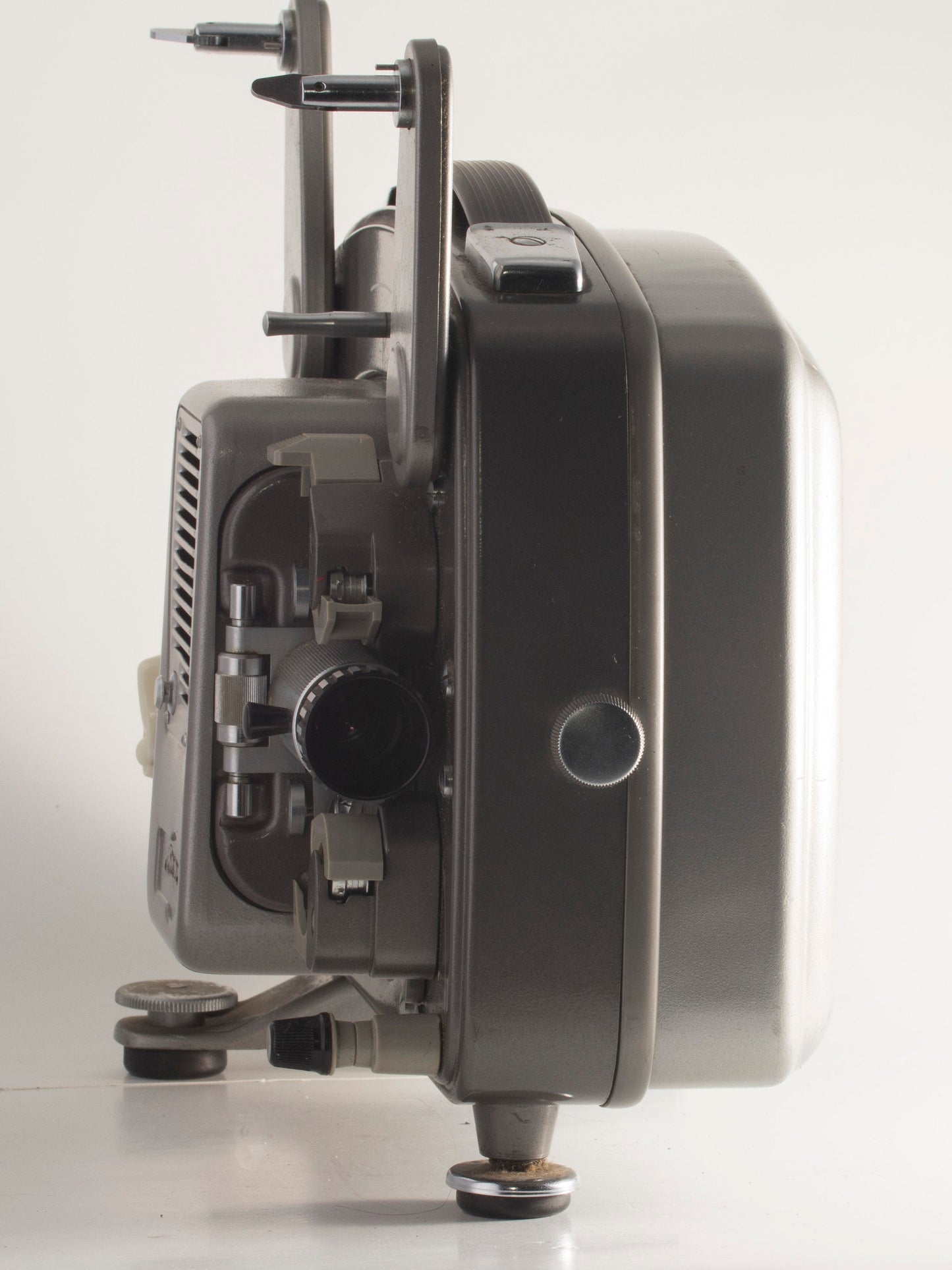 Bolex-Paillard 18-5 Super 8 projector, 1965. One r says Built like  a tank, but it's also built like a watch. Very little plastic here besides  the main control knob, which glows in