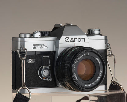 Canon FTb 35mm SLR camera with Canon FD 1:1.8 lens. Angled front view