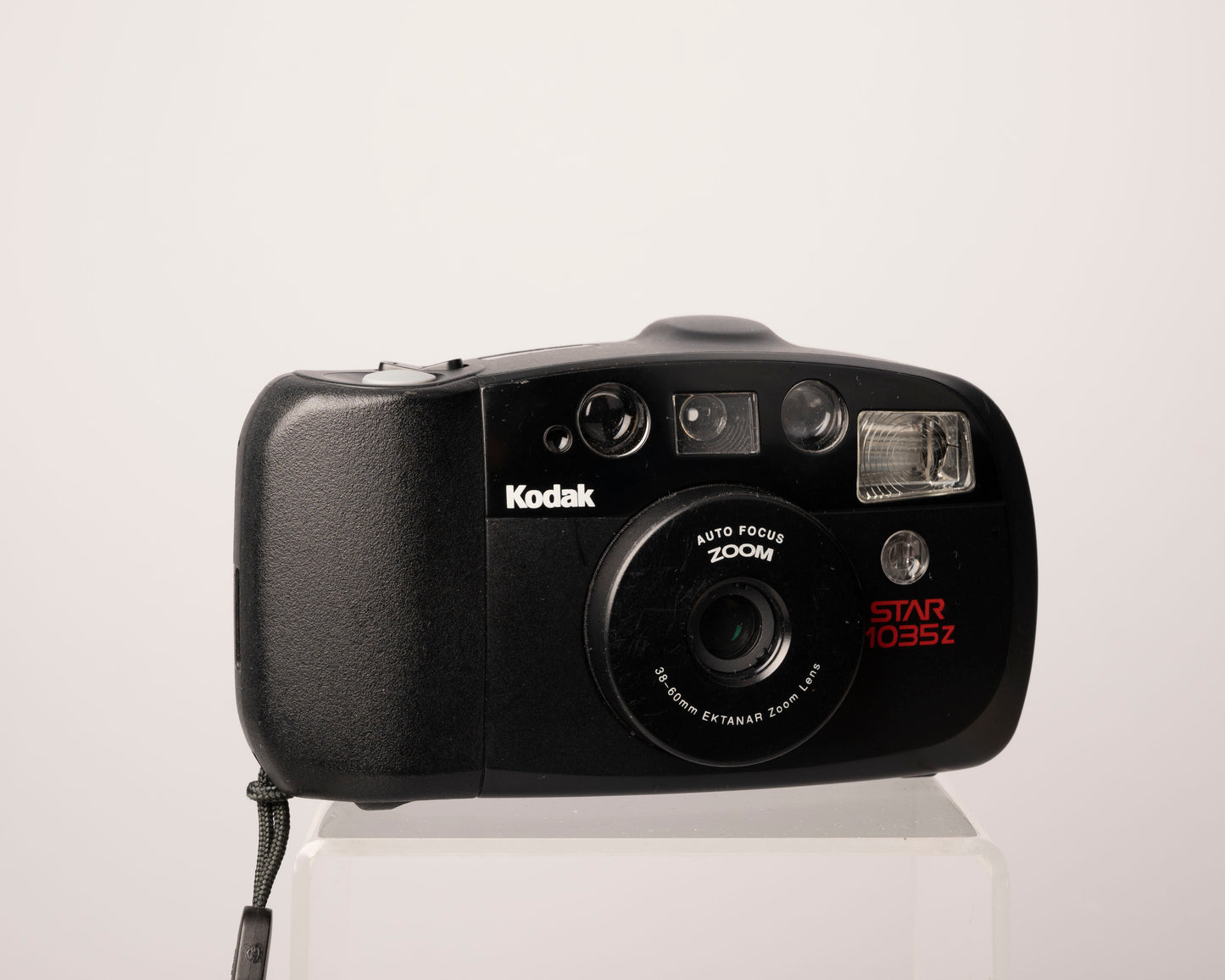 The Kodak Star 1035z is an autofocus 35mm film point-and-shoot from 1993 featuring a 38-60mm lens