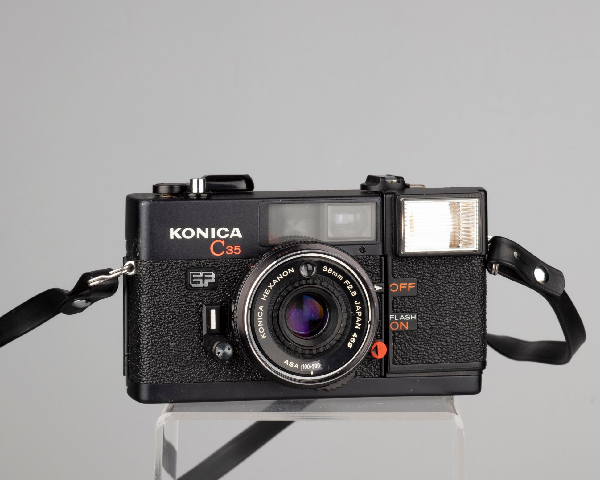 The Konica C35 EF is a classic 35mm viewfinder camera featuring an excellent 38mm f2.8 Hexanon lens