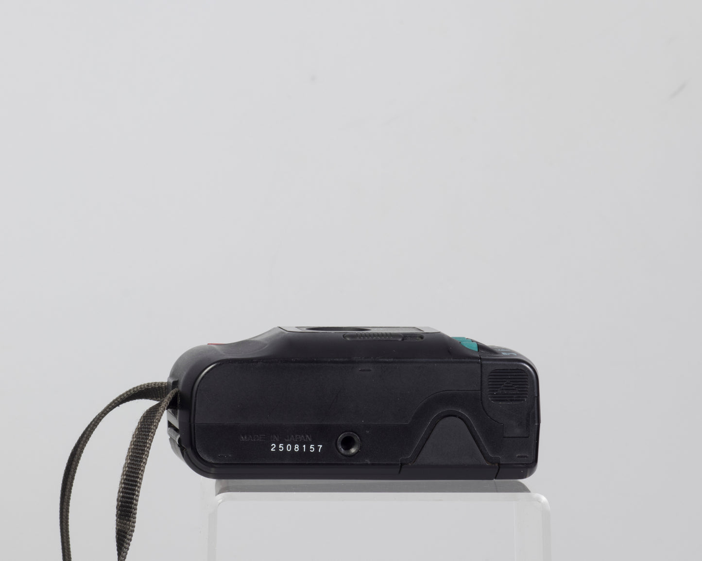 The Konica MT-100 is a 35mm point-and-shoot camera from 1989 (bottom view)