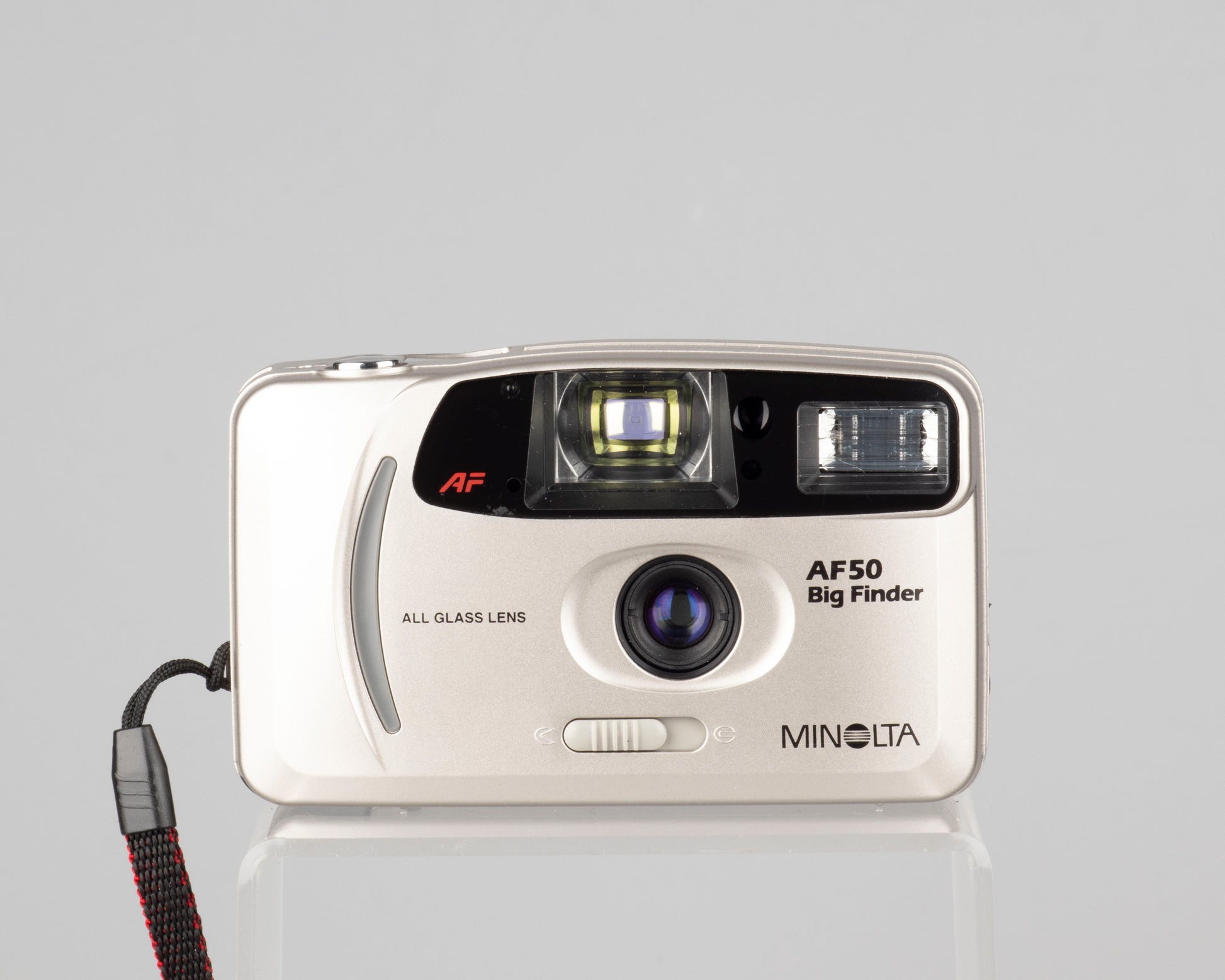 The Minolta AF50 Big Finder is an ultra compact 35mm auto focus camera from the late 1990s