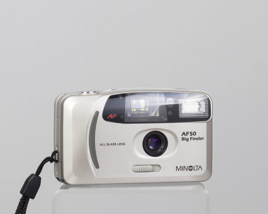 The Minolta AF50 Big Finder is an ultra-compact 35mm film camera from the 1990s.