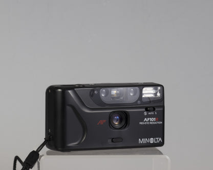 The Minolta AF101R is a compact 35mm point-and-shoot camera featuring a 28mm wide-angle lens
