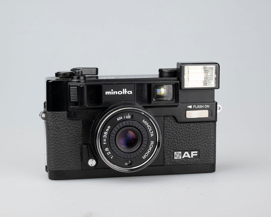 Minolta Hi-Matic AF 35mm camera w/ ever-ready case (serial 296583)