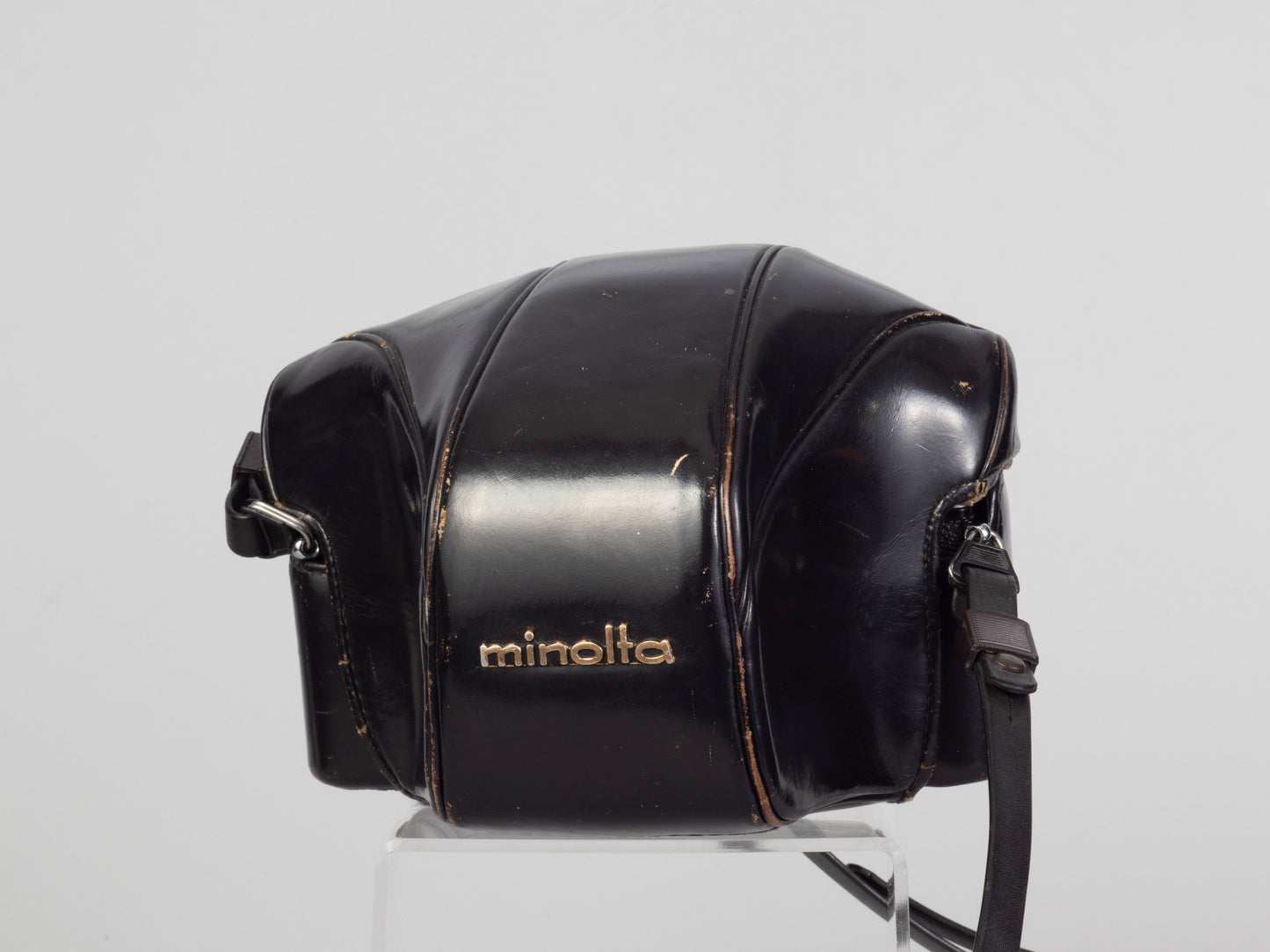 The Minolta SRT-101 35mm film SLR camera with MC Rocker PF 55mm f1.7 lens (everready case)