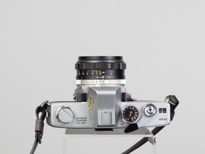 The Minolta SRT-101 35mm film SLR camera with MC Rocker PF 55mm f1.7 lens