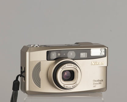 The Nikon One Touch Zoom 90 AF is a compact 35mm film camera with a 38-90mm lens with macro capability