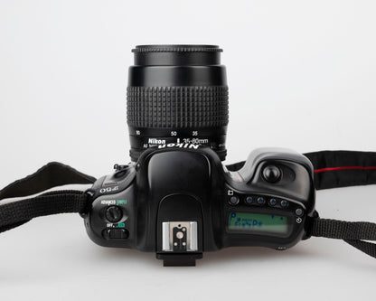 Nikon F50 35mm film SLR zoom outfit w/ AF 35-80mm lens + original boxes