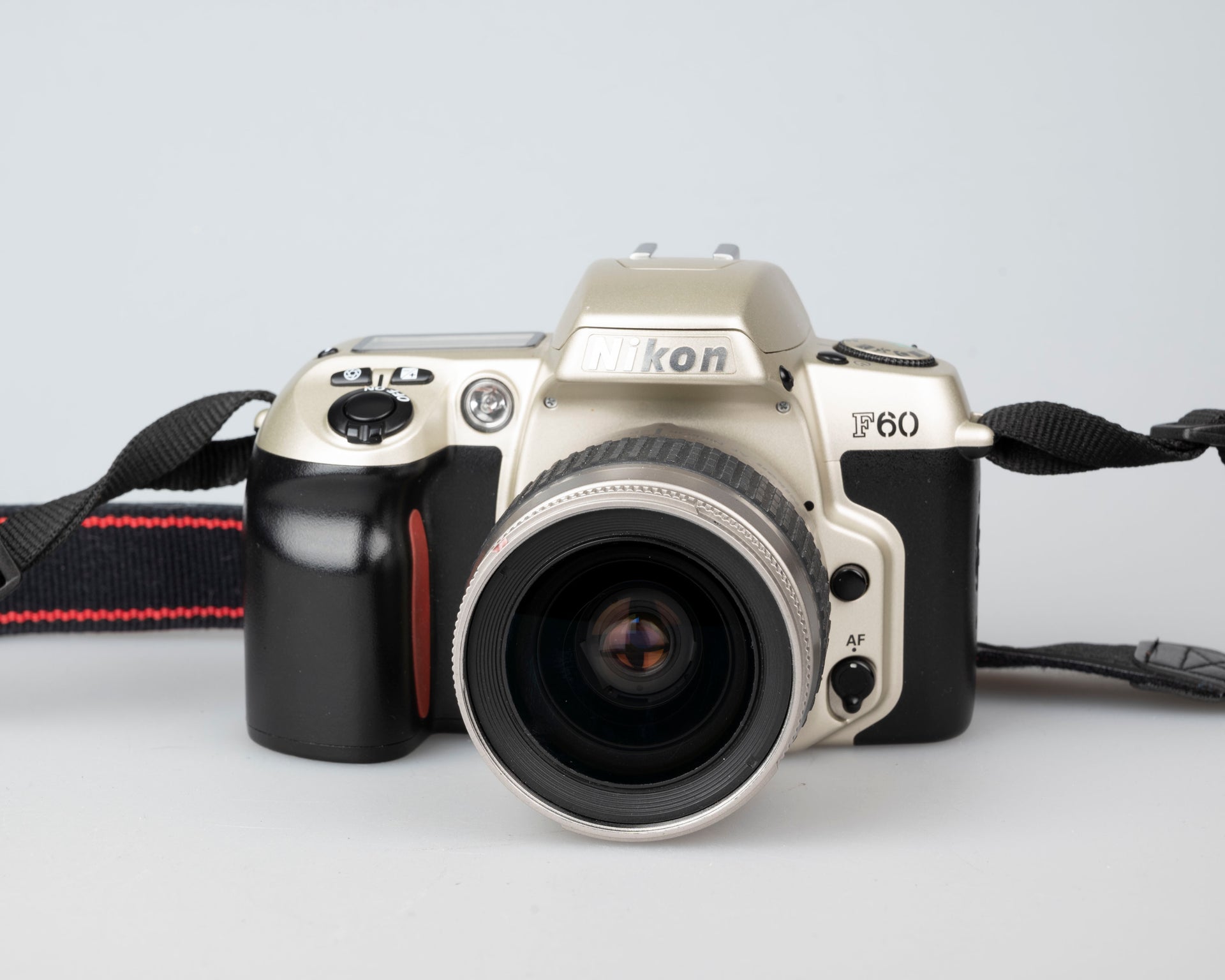 Nikon F60 35mm film SLR w/ AF Nikkor 28-80mm lens + manual (serial 