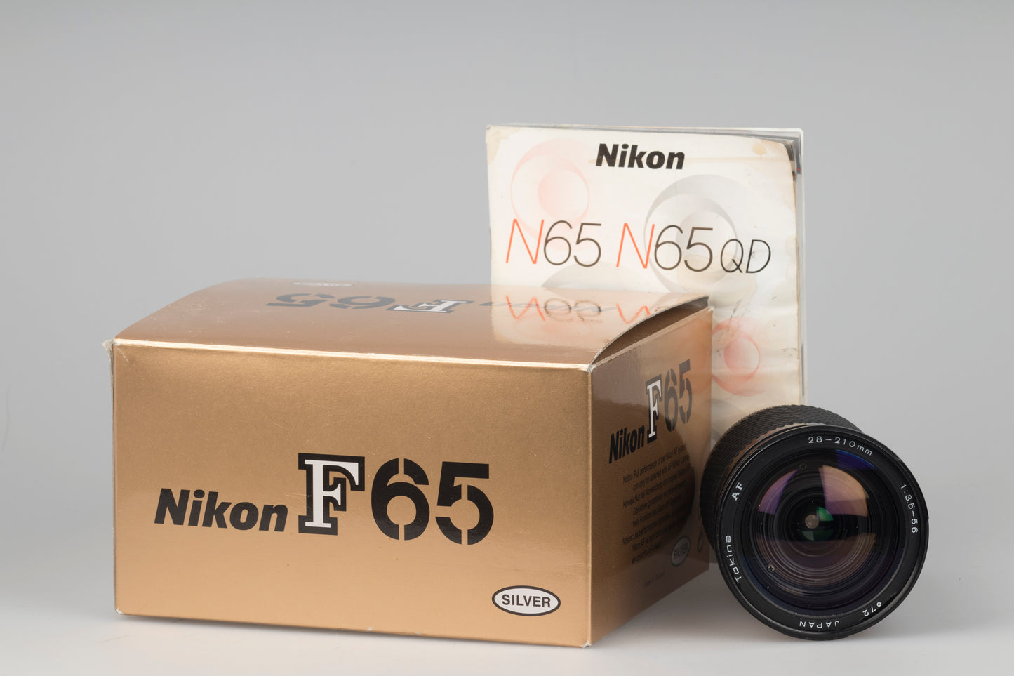 Nikon F65 (aka N65) 35mm film SLR with original box and manual + Tokina AF 28-210mm lens