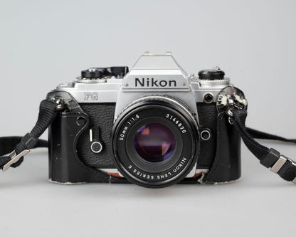 Nikon FG 35mm film SLR camera with 50mm f1.8 lens and ever-ready case