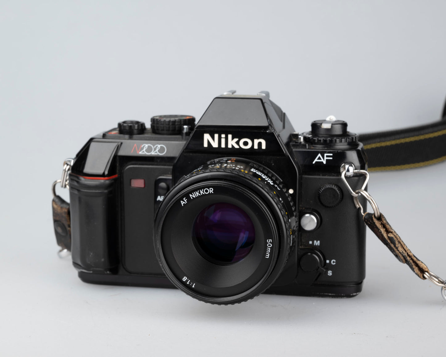 Nikon N2020 35mm film SLR w/ AF Nikkor 50mm f1.8 lens