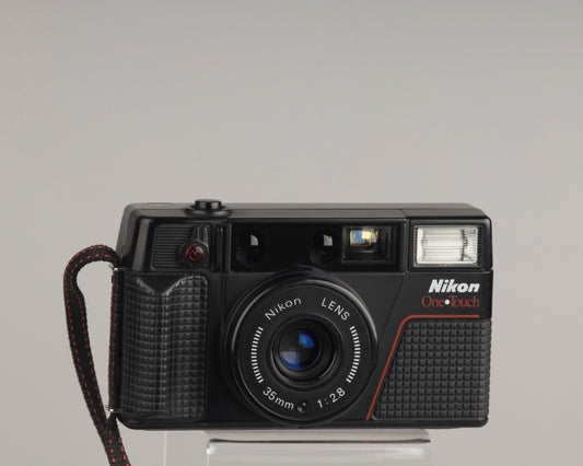 The Nikon One Touch (aka L35AF2) is a classic 1980s 35mm point-and-shoot camera with a sharp 35mm f2.8 lens