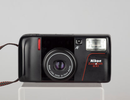 Appareil photo Nikon Zoom Touch 400 35 mm avec étui et manuel (série 5567905)