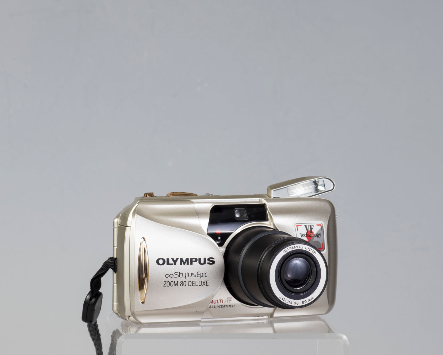 The Olympus Infinity Stylus Epic oom 80 Deluxe (lens zoomed)