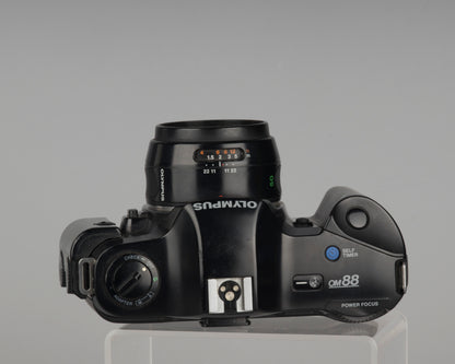 Olympus OM-88 35mm film SLR w/ 50m f2 PF lens and Manual Adapter 2
