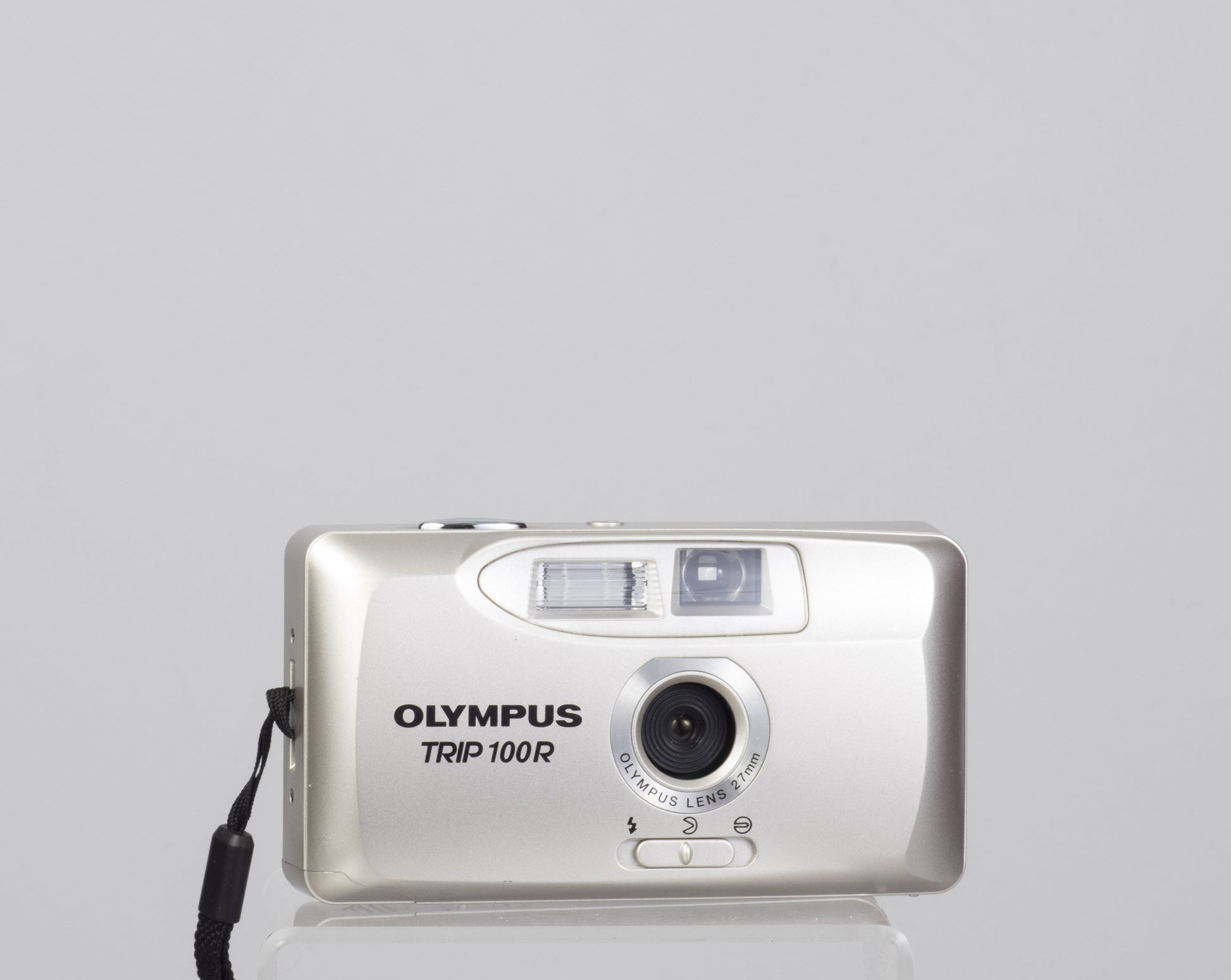 The Olympus Trip 100R compact 35mm camera featuring a wide 27mm lens