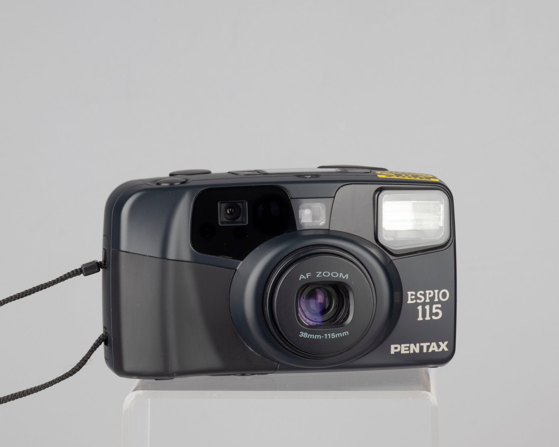 The Pentax Espio 115 (aka Pentax IQZoom 115) is a high quality 35mm point-and-shoot released in 1993