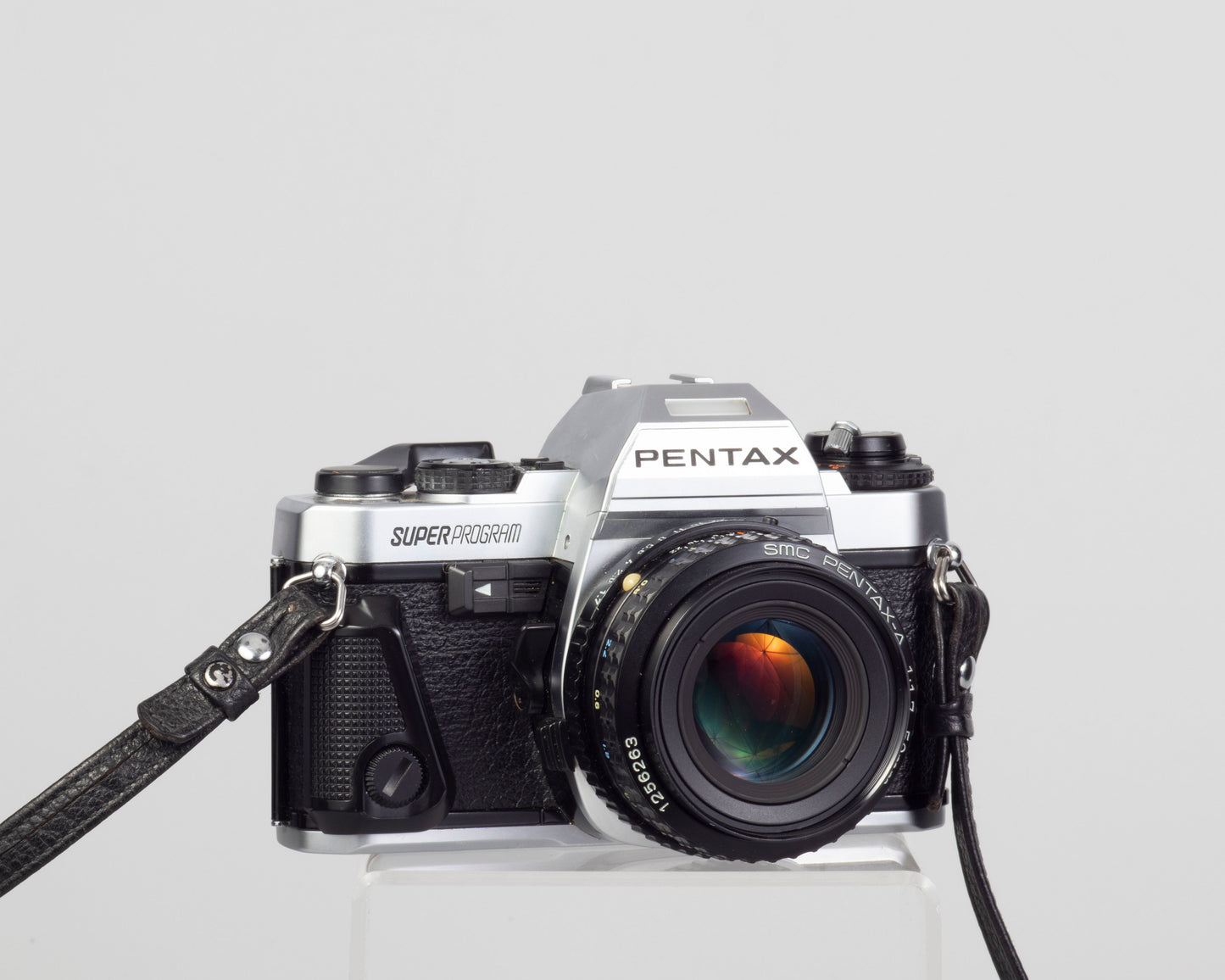 Reflex Pentax Super Program 35 mm avec objectif SMC Pentax A 50 mm f1.7 + ME Winder II + manuel d'origine