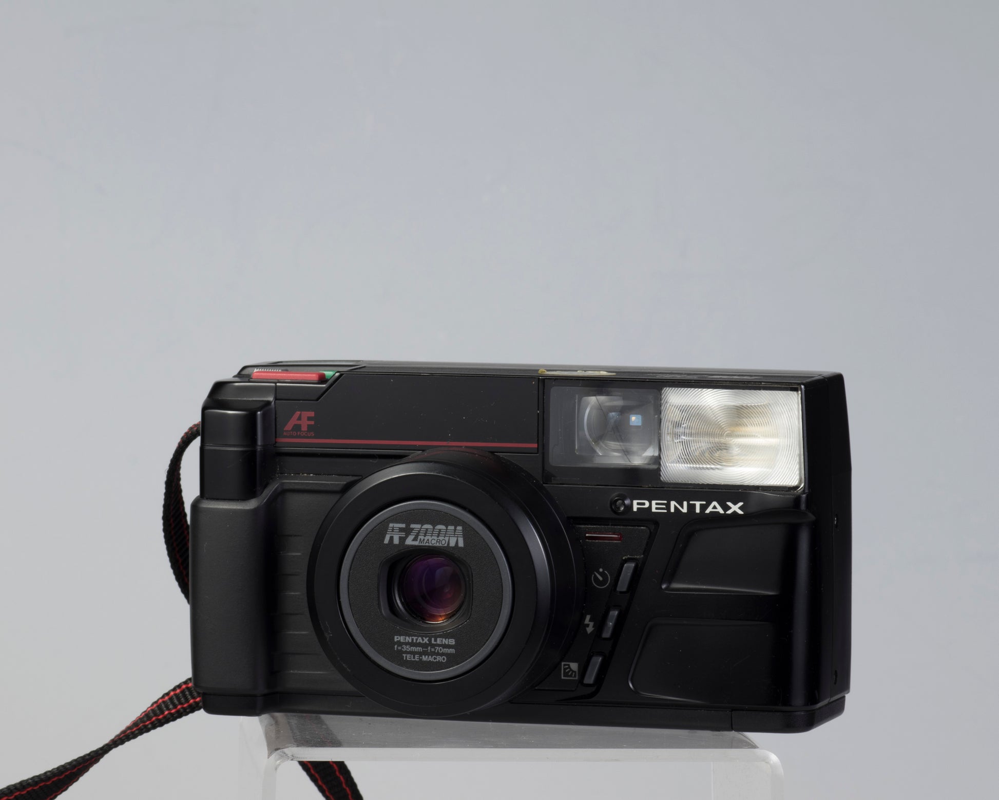 The Pentax Zoom-70 (aka IQZoom) is a quality zoom point-and-shoot released in 1986. It is the first of the long-running IQZoom/Espio series.