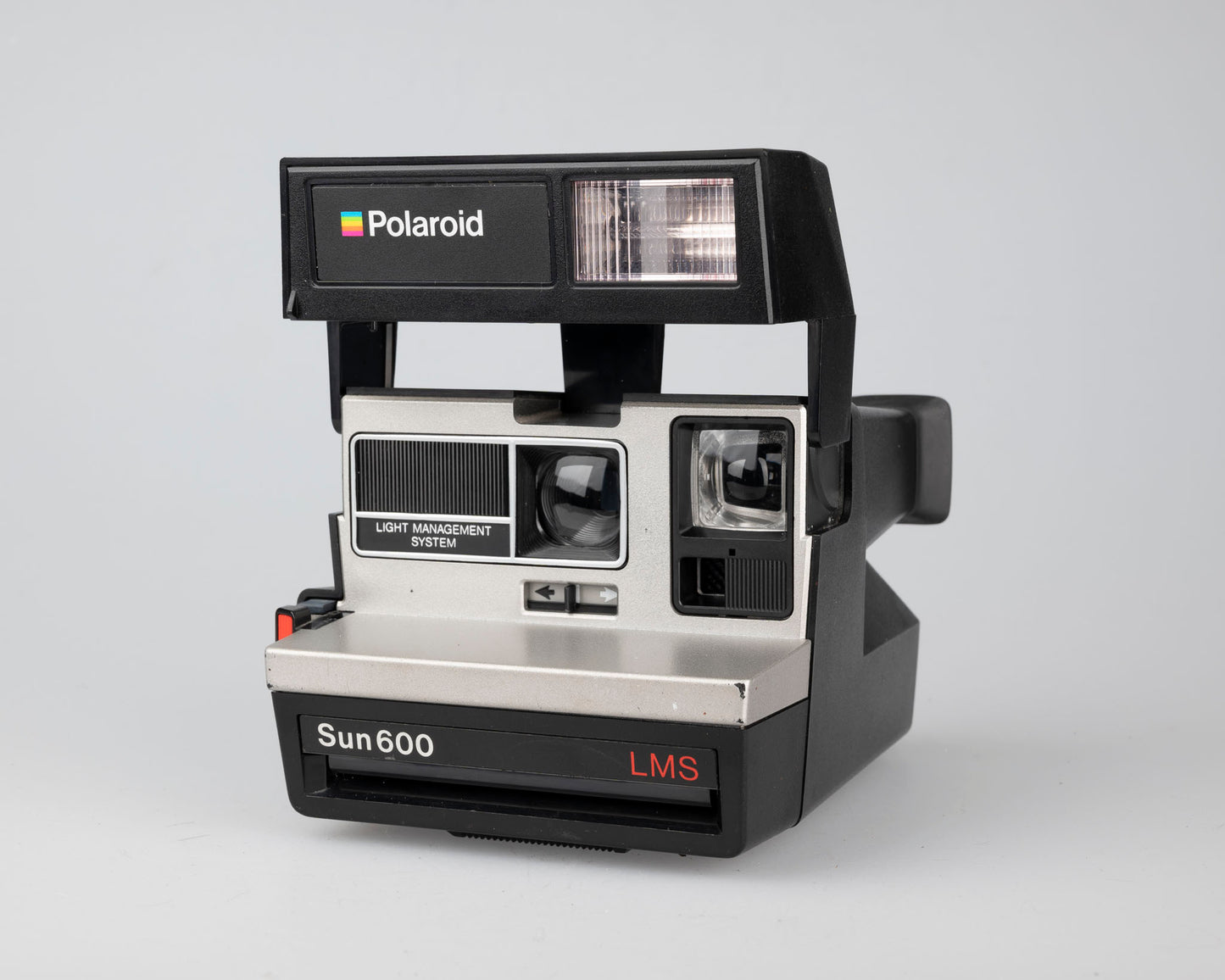 Polaroid Sun 600 LMS instant film camera (serial D5E45858)