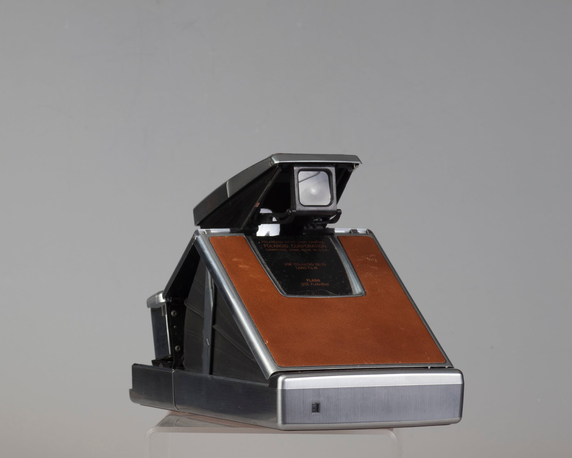Polaroid SX-70 instant camera with original leather case