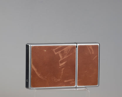 Polaroid SX-70 instant camera with original leather case