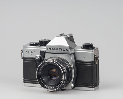 Praktica MTL 5 35mm film SLR camera with Rikenon 55mm f2.8 lens and ever-ready case