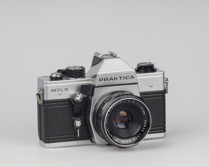 Praktica MTL 5 35mm film SLR camera with Rikenon 55mm f2.8 lens and ever-ready case
