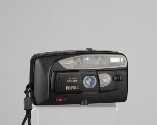 The Ricoh RW-1 is a water-resistant compact 35mm film camera with a 34mm wide-angle lens