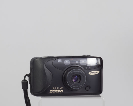 Samsung AF Slim Zoom 35mm film camera w/ case (flash not working)