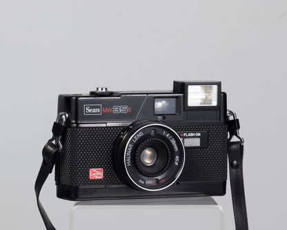 The Sears (Halina) MW35E is a simple zone focus 35mm camera (flash on)