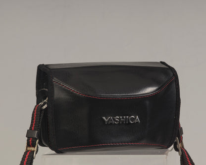 The Yashica Auto Focus Motor (shown in ever-ready case) is a classic 35mm point-and-shoot film camera featuring a 38mm f2.8 lens