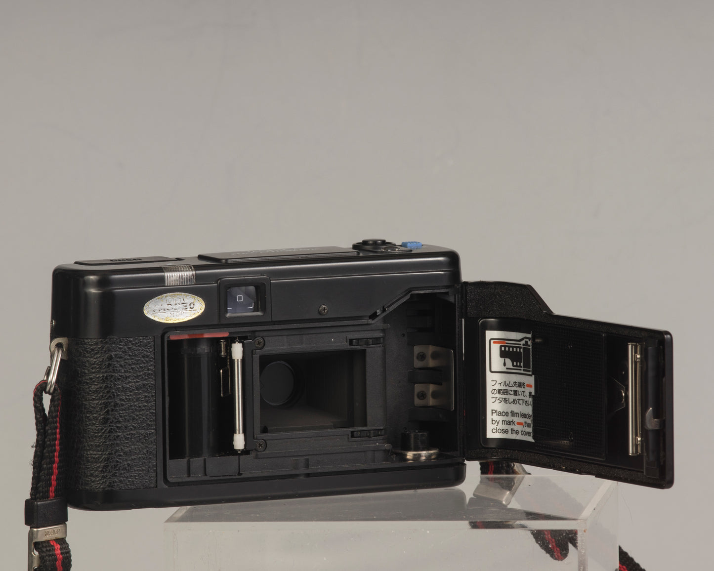 The Yashica Auto Focus Motor (shown with film door open) is a classic 35mm point-and-shoot film camera featuring a 38mm f2.8 lens